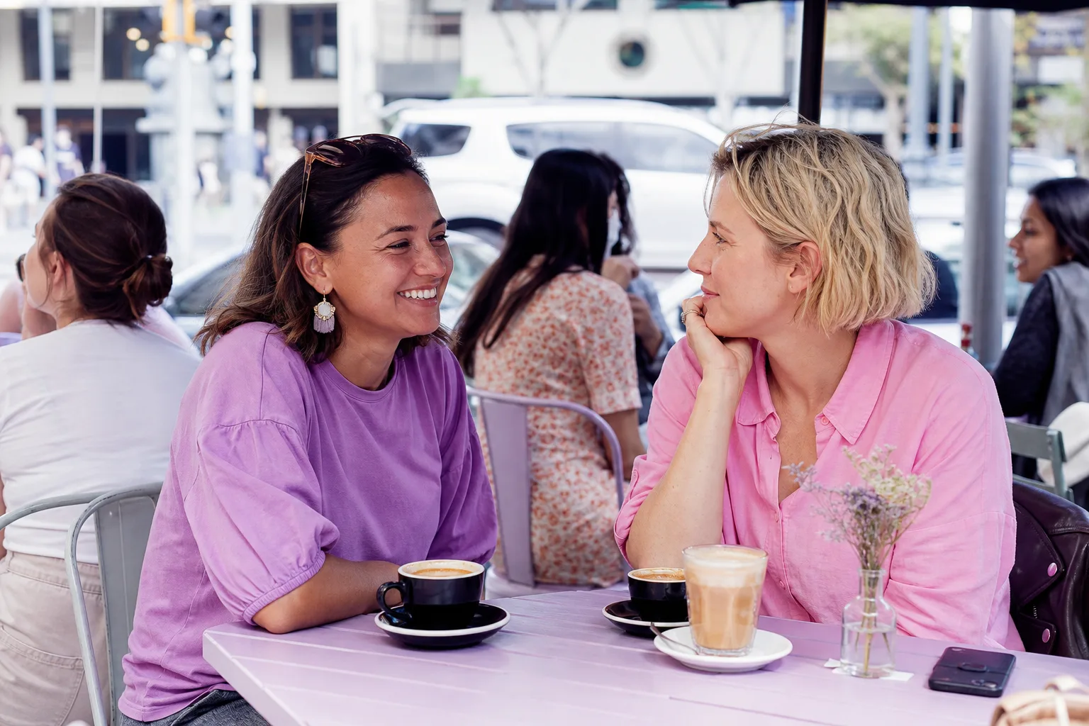 Two women chatting over coffee in Worcestershire
